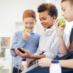 school-children-using-phone-at-school.jpg school-children-using-phone-at-school.jpg